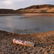 A buoy sits near a closed boating area on Lake Mead.